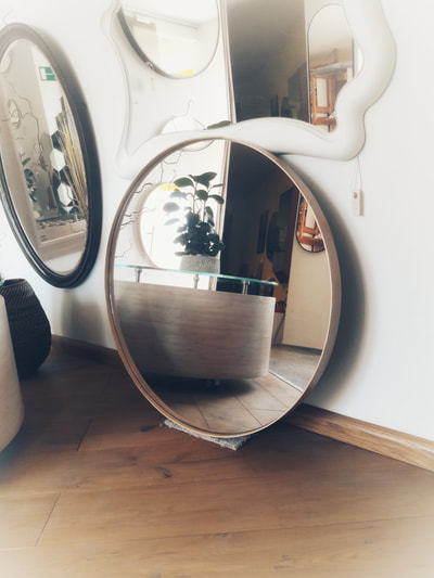 large round mirror wood frame