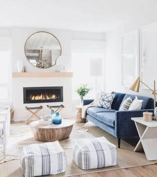 Round mirror over fireplace