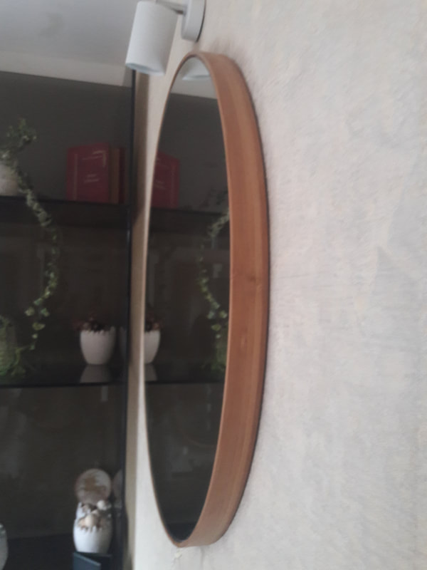 How to hang a round mirror