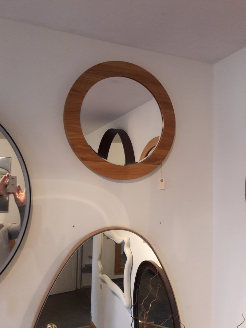 How to hang round mirror